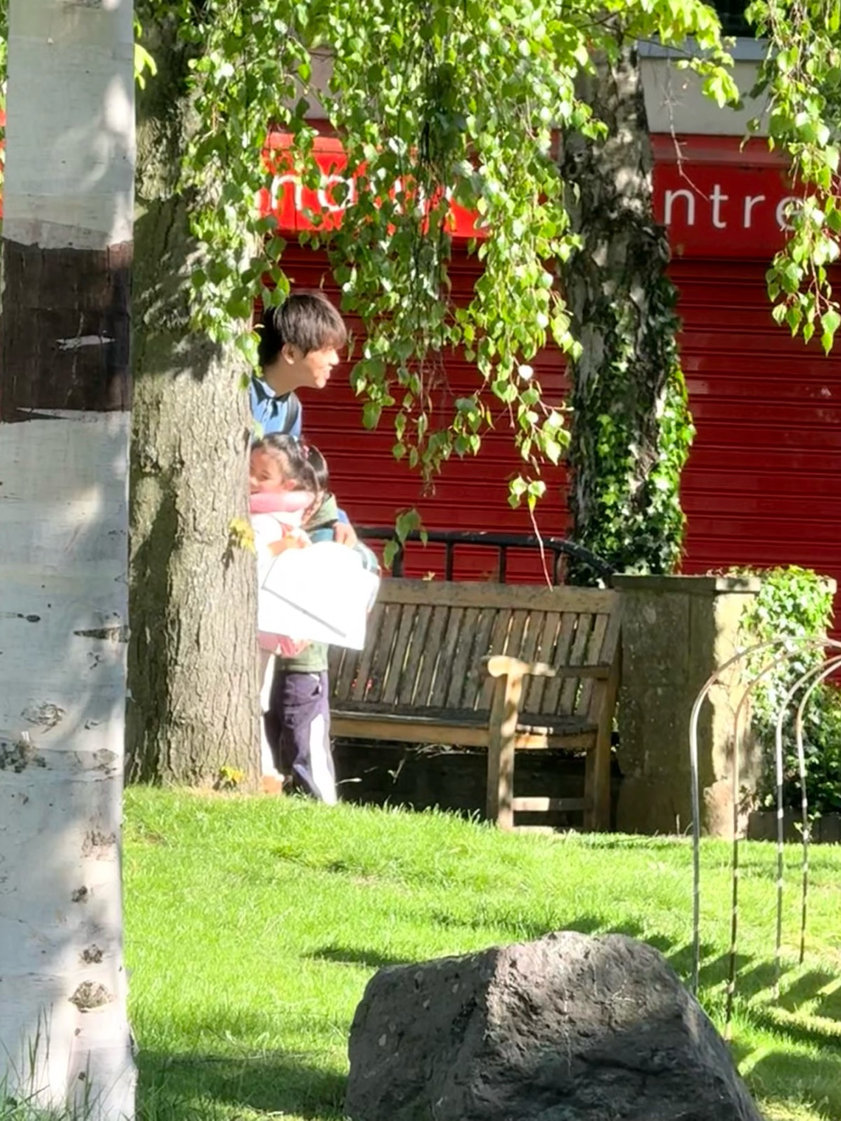 A child greeting Vince outdoors after class